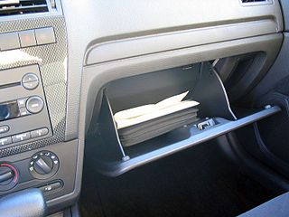 Car owner's manual in a glove box - picture by Q4RadioGuy