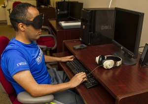 a trainee learns how it feels to use a computer with a visual impariment