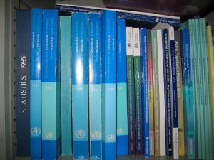 statistics books on a shelf