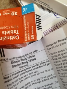 packet of tablets with user instructions opened up alongside