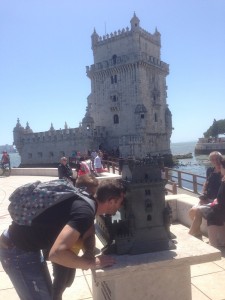 An adult tourist explores the tower end of the model