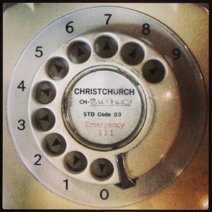 vintage phone with old UK area code on the dial