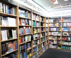 rows of books i the computing section of Foyles bookstore