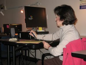 older woman sitting at computer