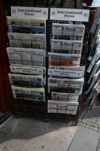rack of international newspapers