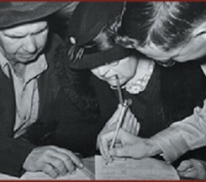 people filling out a survey together