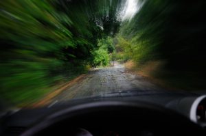blurred scene from speeding car