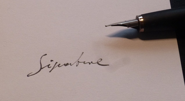 the word signature, written with a fountain pen