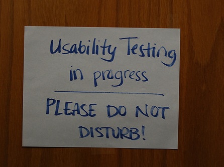 picture of handwritten sign on door reading 'Usability Testing in progress, PLEASE DO NOT DISTURB