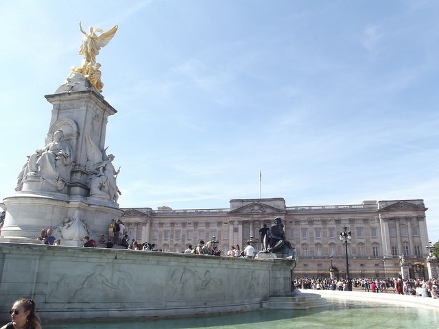 A view of the Victoria memorial with Buckingham Palace in the background
