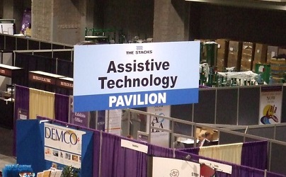 Large sign indicating 'Assistive Technology' pavilion at an exhibition