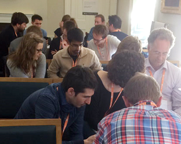 Attendees at UX Cambridge work on a design exercise