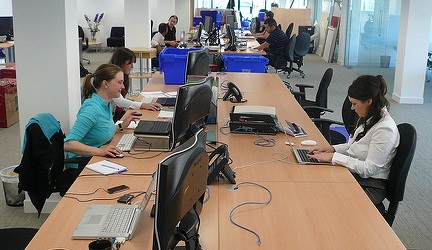 people working at their computers in an office