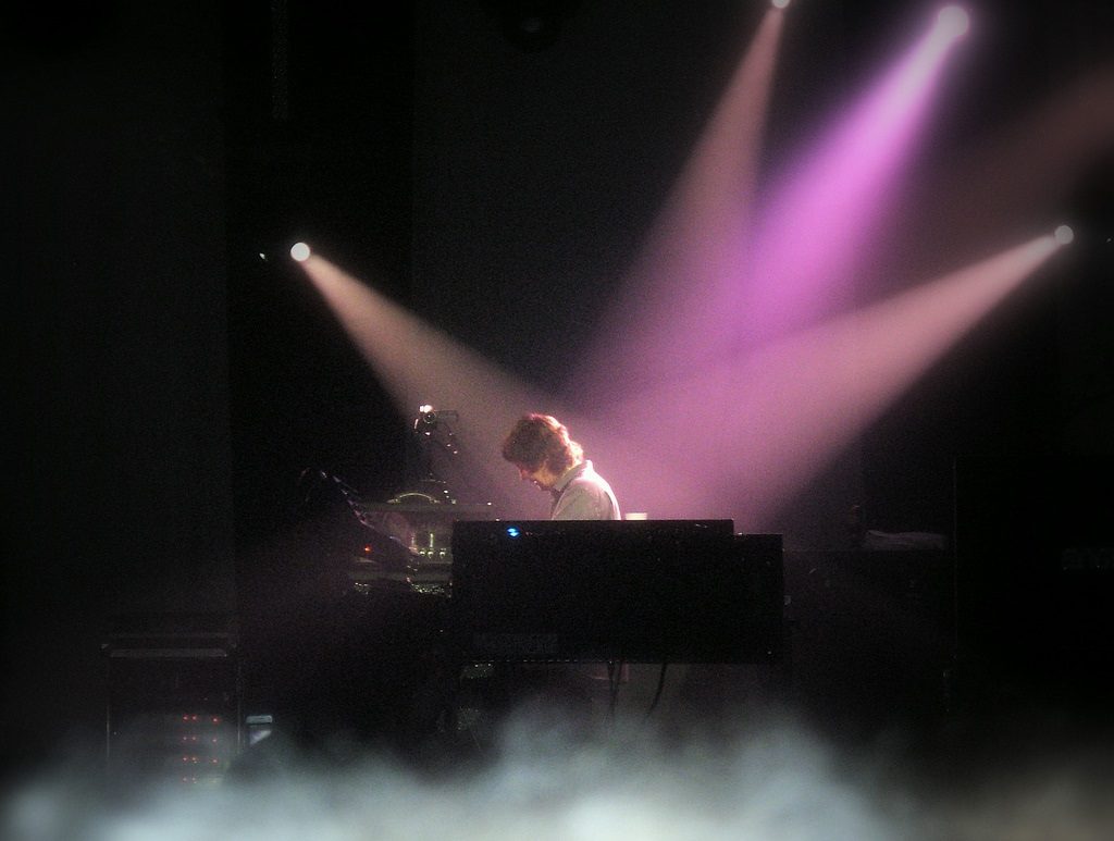 Deep Purple play a concert under purple lights