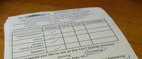 large pile of completed surveys