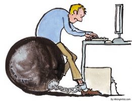 man chained to his computer