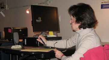 older woman sitting at computer