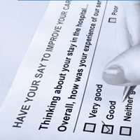 Detail of a paper survey, including the quesiton "Thinking about your stay in hospital ... Overall how was your experience of our service?"